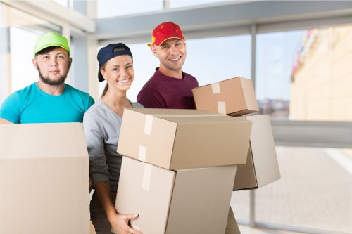 Removal van and moving team in Kew street