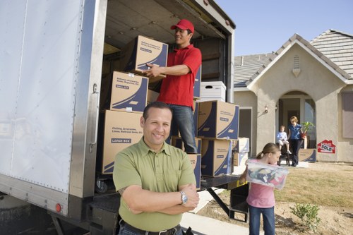 Professional mover handling items for a Kew relocation