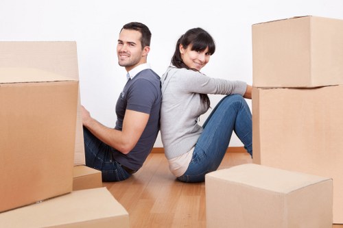 Worker handling goods safely in a self-storage environment